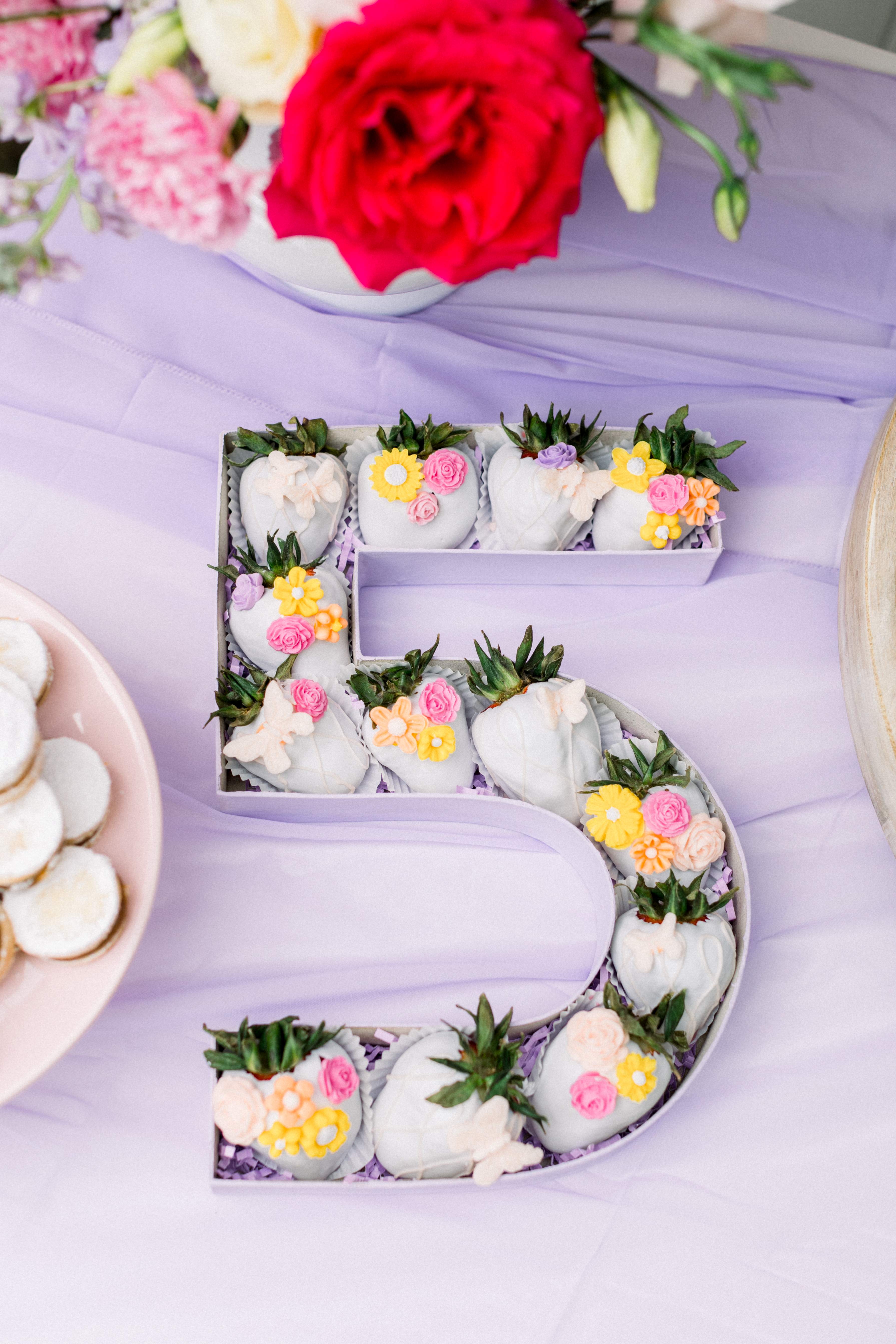 Number 5 shaped arrangement of chocolate covered strawberries