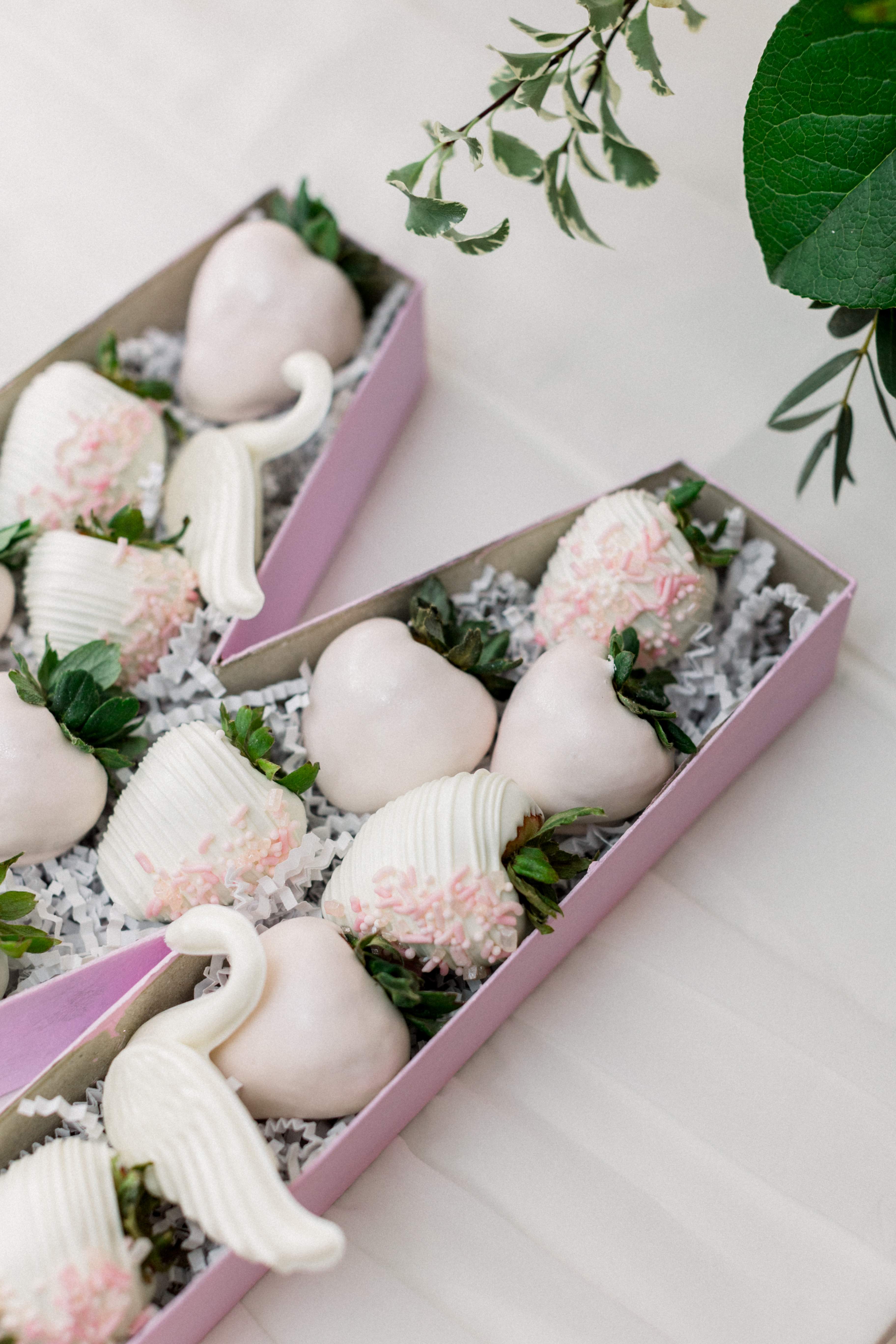Artisan crafted chocolate strawberries with swan designs